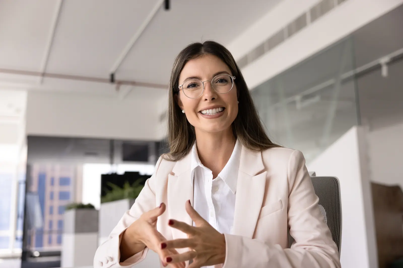 Pharmacist speaking to a patient on a video consultation